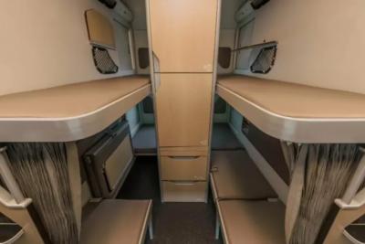 Спальный вагон нового поколения: РЖД показала купе с двухметровыми полками и яхтенным стилем